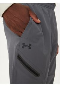 Under Armour Spodnie outdoor UA Unstoppable 1388823 Szary Loose Fit. Kolor: szary. Materiał: syntetyk. Sport: outdoor