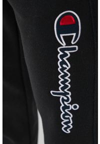 Champion Spodnie 114471 damskie kolor czarny z aplikacją. Kolor: czarny. Materiał: bawełna, dzianina. Wzór: aplikacja #2