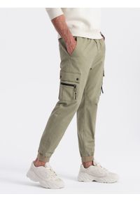 Ombre Clothing - Męskie spodnie JOGGERY z zapinanymi kieszeniami cargo - khaki V1 OM-PAJO-0125 - XXL. Okazja: na co dzień. Kolor: brązowy. Materiał: elastan, bawełna. Wzór: aplikacja. Styl: casual