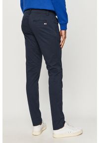 Tommy Jeans - Spodnie. Kolor: niebieski. Materiał: tkanina, bawełna, elastan. Wzór: gładki #4