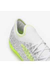 KIPSTA - Buty piłkarskie dla dzieci Kipsta CLR FG jr Jaguar Boost sznurowane. Kolor: biały. Materiał: syntetyk. Szerokość cholewki: normalna. Sport: piłka nożna
