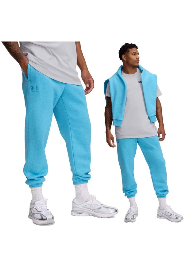 Spodnie dresowe męskie Under Armour joggery. Kolor: niebieski. Materiał: dresówka. Długość: długie