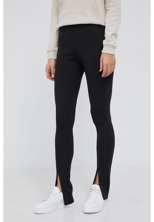 Calvin Klein Spodnie damskie kolor czarny gładkie. Kolor: czarny. Materiał: poliester. Wzór: gładki