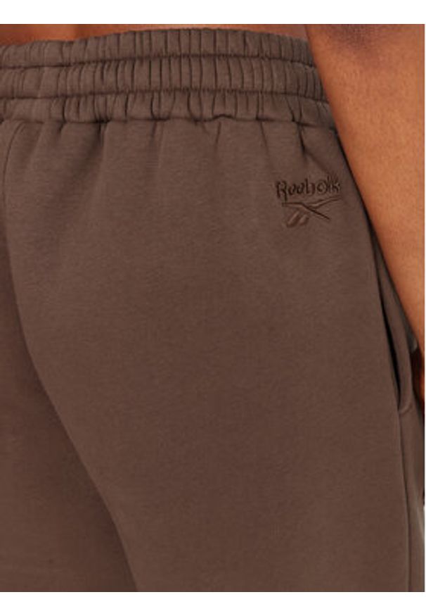 Reebok Spodnie dresowe Reebok X Ewa Chodakowska RK25304CCW Brązowy Regular Fit. Kolor: brązowy. Materiał: syntetyk, bawełna