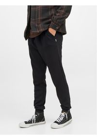 Jack & Jones - Jack&Jones Spodnie dresowe Gordon 12249274 Czarny Regular Fit. Kolor: czarny. Materiał: syntetyk, bawełna