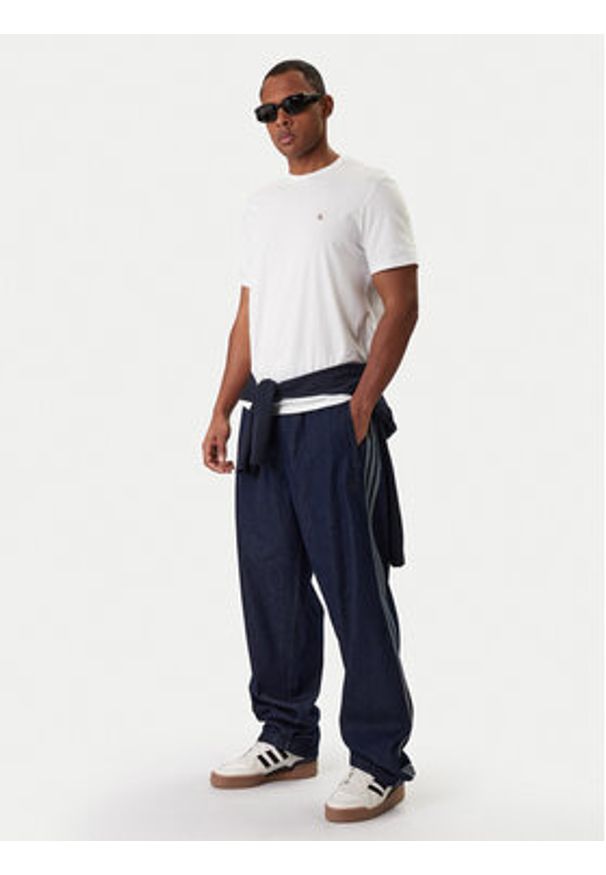 Adidas - adidas Jeansy adicolor Denim Stone JX6459 Niebieski Regular Fit. Kolor: niebieski