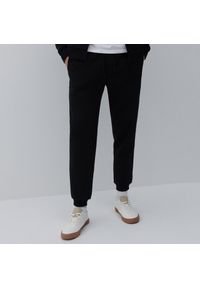 Reserved - Melanżowe spodnie dresowe - Czarny. Kolor: czarny. Materiał: dresówka. Wzór: melanż #1