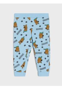 Sinsay - Spodnie dresowe ze ściągaczami Scooby-Doo - niebieski. Kolor: niebieski. Materiał: dresówka