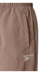 Reebok Spodnie dresowe Kalina RK25694CCW - LIGHT COCOA/LINEN Brązowy Relaxed Fit. Kolor: brązowy. Materiał: syntetyk #3