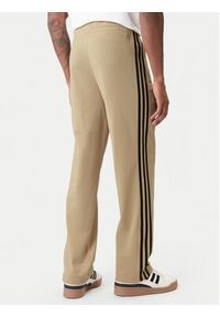 Adidas - adidas Spodnie dresowe Firebird KE6679 Beżowy Loose Fit. Kolor: beżowy. Materiał: syntetyk #5