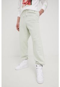 Levi's® - Levi's spodnie dresowe męskie kolor zielony gładkie. Kolor: zielony. Materiał: dresówka. Wzór: gładki