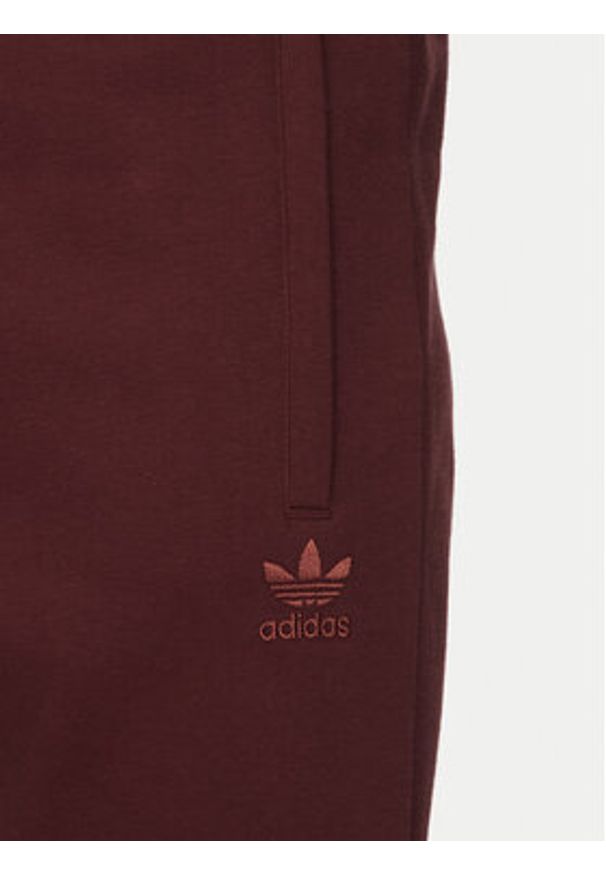 Adidas - adidas Spodnie dresowe Trefoil Essentials JD2420 Bordowy Slim Fit. Kolor: czerwony. Materiał: syntetyk, bawełna