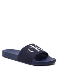 Calvin Klein Jeans Klapki Slide Monogram Co YM0YM00061 Granatowy. Kolor: niebieski. Materiał: materiał #5