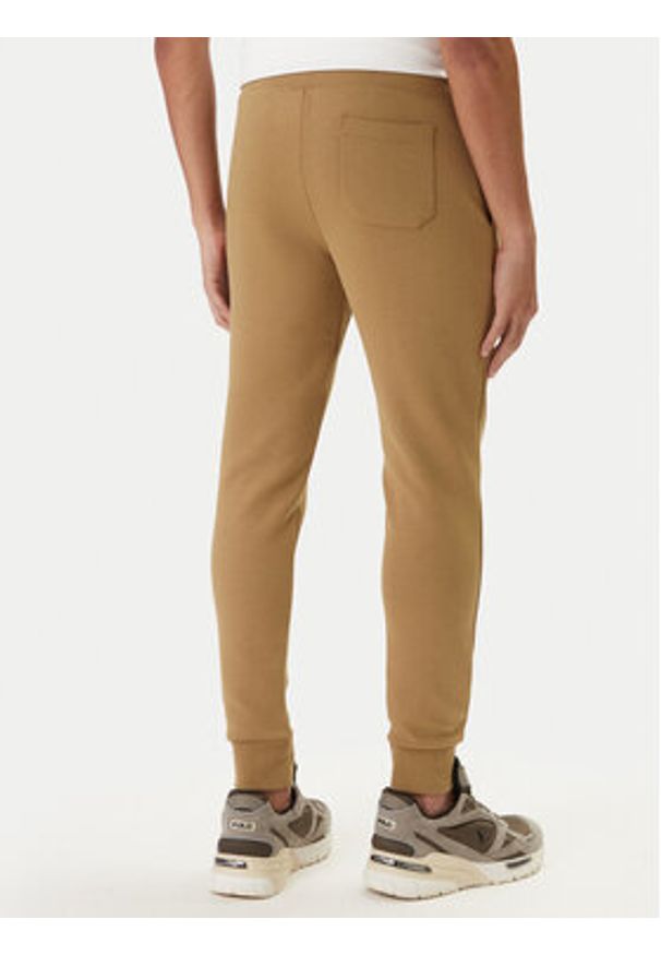 Polo Ralph Lauren Spodnie dresowe 710881518502 Beżowy Regular Fit. Kolor: beżowy. Materiał: syntetyk, bawełna