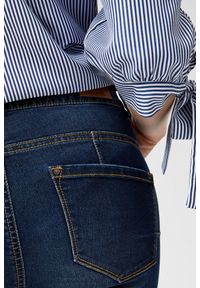 MOODO - Jeansy z wytarciami. Materiał: jeans. Długość: długie. Wzór: gładki #3