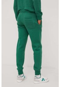 Superdry spodnie dresowe męskie kolor zielony melanżowe. Kolor: zielony. Materiał: dresówka. Wzór: melanż