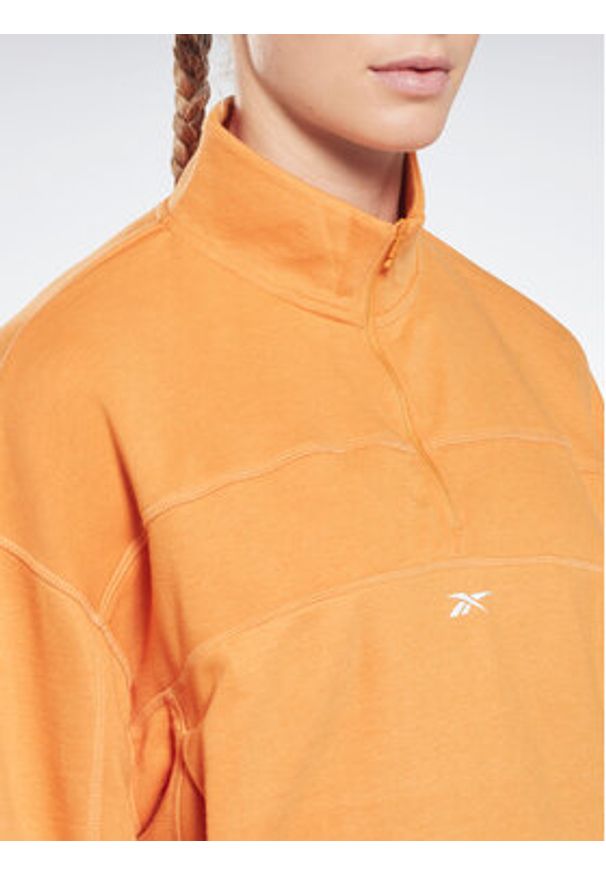 Reebok Bluza Workout Ready HT6043 Pomarańczowy Relaxed Fit. Kolor: pomarańczowy. Materiał: syntetyk, bawełna