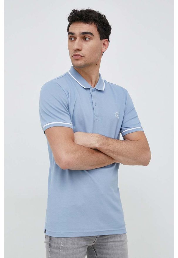 Calvin Klein Jeans polo męski kolor niebieski wzorzysty. Typ kołnierza: polo. Kolor: niebieski. Materiał: dzianina. Długość: krótkie
