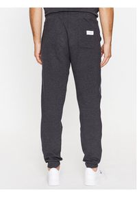 TOMMY HILFIGER - Tommy Hilfiger Spodnie dresowe UM0UM03013 Szary Regular Fit. Kolor: szary. Materiał: bawełna #3