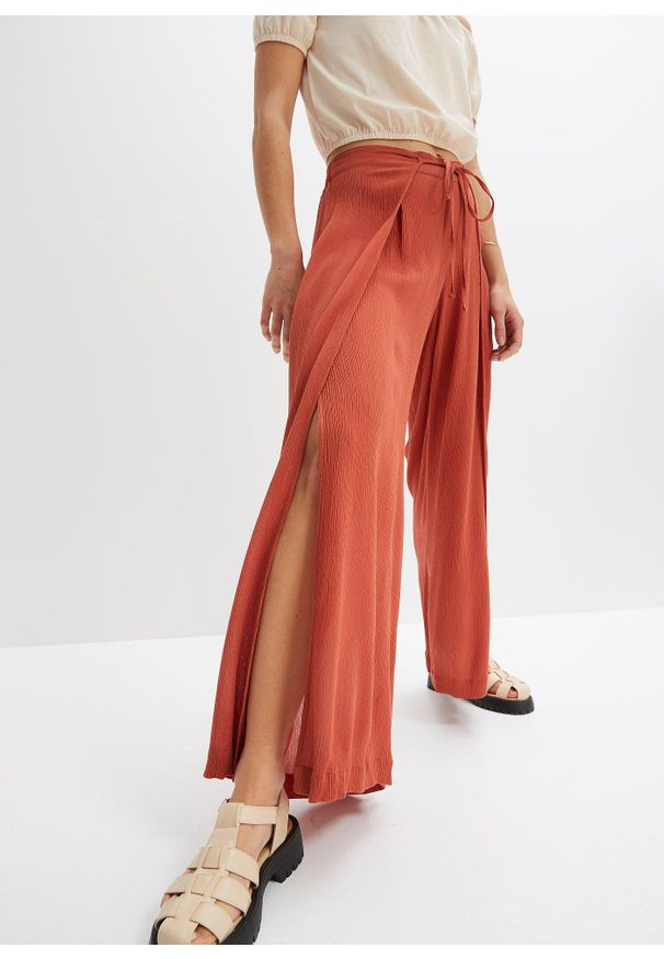 bonprix - Spodnie z lejącej wiskozy. Kolor: brązowy. Materiał: wiskoza