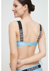 Calvin Klein biustonosz kąpielowy kolor niebieski miękka miseczka. Kolor: niebieski. Materiał: dzianina, poliamid #3