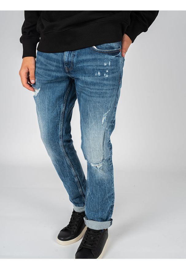 TOMMY HILFIGER - Tommy Jeans Jeansy "Scanton" | DM0DM13202 | Scanton | Mężczyzna | Niebieski. Kolor: niebieski. Wzór: aplikacja