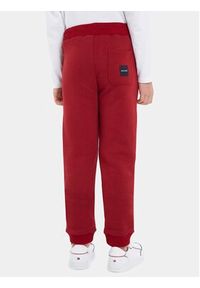 TOMMY HILFIGER - Tommy Hilfiger Spodnie dresowe Monotype KB0KB08278 M Bordowy Regular Fit. Kolor: czerwony. Materiał: bawełna