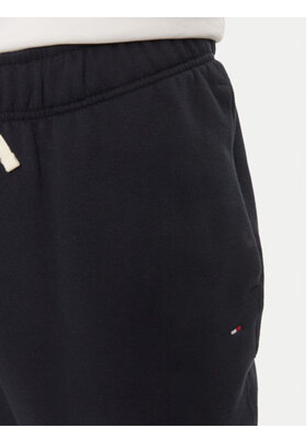 TOMMY HILFIGER - Tommy Hilfiger Spodnie dresowe Essential MW0MW37231 Granatowy Relaxed Fit. Kolor: niebieski. Materiał: bawełna, syntetyk