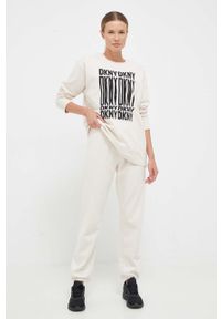 DKNY - Dkny spodnie dresowe kolor beżowy gładkie. Kolor: beżowy. Materiał: dresówka. Wzór: gładki #3