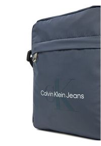 Calvin Klein Jeans Saszetka Sport Essentials Reporter 18 LV04G3000G Granatowy. Kolor: niebieski. Materiał: materiał