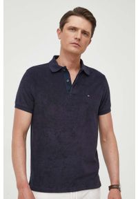 TOMMY HILFIGER - Tommy Hilfiger polo męski kolor granatowy gładki. Typ kołnierza: polo. Kolor: niebieski. Materiał: dzianina. Wzór: gładki #1