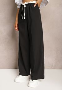 Renee - Czarne Materiałowe Spodnie z Szerokimi Nogawkami High Waist z Gumką w Talii Comina. Okazja: na co dzień. Stan: podwyższony. Kolor: czarny. Materiał: materiał. Styl: elegancki, casual