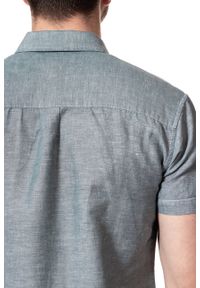 Wrangler - KOSZULA MĘSKA KRÓTKI RĘKAW WRANGLER S/S 1PKT SHIRT OCEAN TEAL W5916LPDP. Materiał: materiał. Długość rękawa: krótki rękaw. Długość: krótkie. Wzór: melanż #6