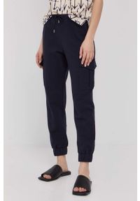 MAX&Co. spodnie bawełniane damskie kolor granatowy joggery high waist. Stan: podwyższony. Kolor: niebieski. Materiał: bawełna