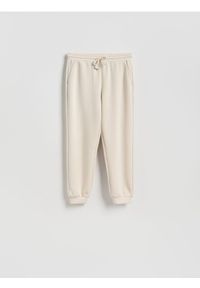 Reserved - Dresowe joggery - beżowy. Kolor: beżowy. Materiał: dresówka #1