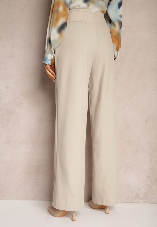 Renee - Beżowe Szerokie Spodnie z Imitacją Kieszeni Garniturowe High Waist Iriniael. Stan: podwyższony. Kolor: beżowy. Materiał: tkanina