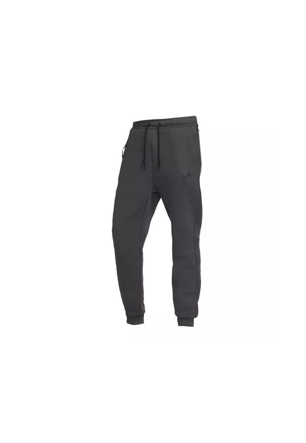 Spodnie sportowe męskie Nike FB8002060. Kolor: szary. Materiał: dresówka. Długość: długie