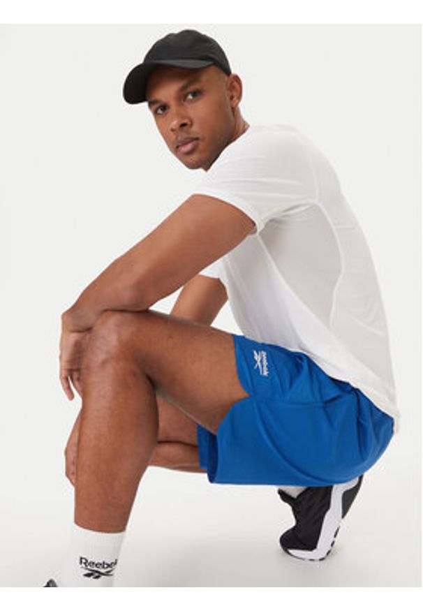 Reebok Szorty sportowe Best RK25557CCM Niebieski Regular Fit. Kolor: niebieski. Materiał: syntetyk. Styl: sportowy