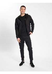 Bluza z kapturem i zamkiem błyskawicznym Hummel MT Interval. Typ kołnierza: kaptur. Kolor: czarny