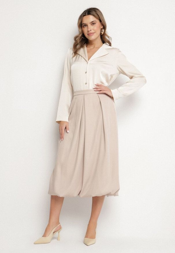 Born2be - Beżowa Spódnica z Wiskozą o Rozkloszowanym Kroju z Zakładkami Voreza. Okazja: na co dzień. Kolor: beżowy. Materiał: wiskoza. Styl: elegancki, casual