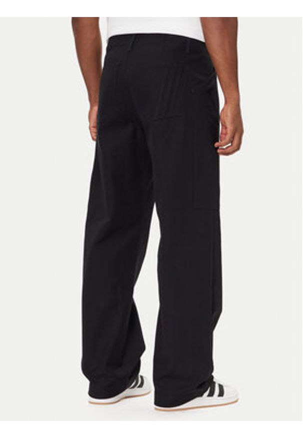 Adidas - adidas Spodnie materiałowe Utility JY2770 Czarny Regular Fit. Kolor: czarny. Materiał: bawełna