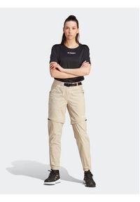 Adidas - adidas Spodnie dresowe Terrex Utilitas Hiking Zip-Off Tracksuit Bottoms HZ9046 Beżowy Regular Fit. Kolor: beżowy. Materiał: syntetyk #3