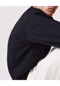Lacoste - LACOSTE - Czarna bluza z logo. Kolor: czarny. Materiał: bawełna. Wzór: prążki