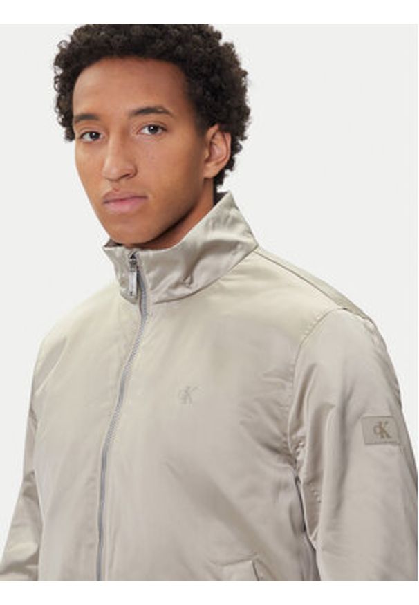 Calvin Klein Jeans Kurtka bomber Harrington LV04RC516G Beżowy Regular Fit. Kolor: beżowy. Materiał: syntetyk