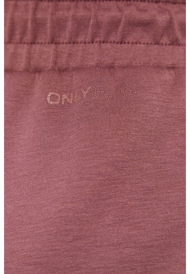 Only Play - Spodnie. Kolor: różowy. Materiał: dzianina. Wzór: gładki