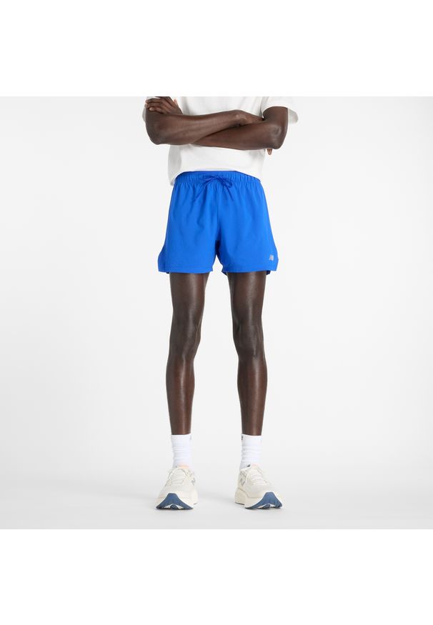 Spodenki męskie New Balance MS41286BUM – niebieskie. Kolor: niebieski. Materiał: materiał, tkanina, poliester. Sport: fitness