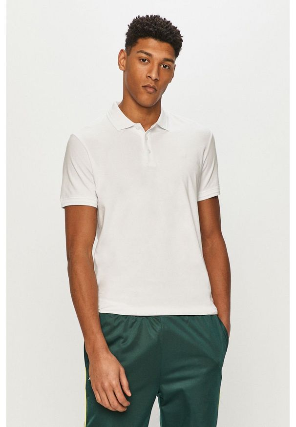 Premium by Jack&Jones - Polo. Okazja: na co dzień. Typ kołnierza: polo. Kolor: biały. Materiał: bawełna, dzianina, elastan. Długość: krótkie. Wzór: gładki. Styl: casual