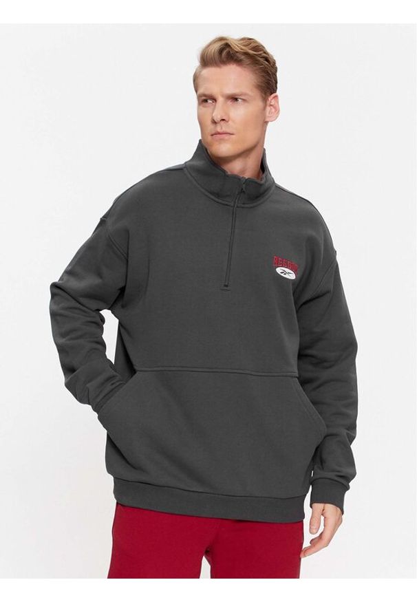 Reebok Bluza Archive Essentials IL8801 Szary Regular Fit. Kolor: szary. Materiał: bawełna