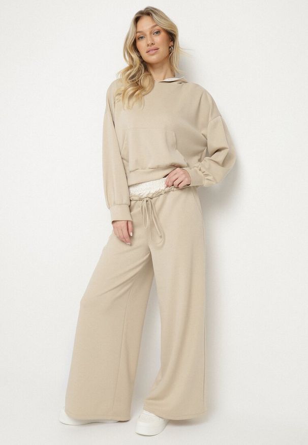 Born2be - Beżowy Komplet Dresowy z Wiskozą Bluza z Kapturem i Szerokie Spodnie Liseriela. Kolor: beżowy. Materiał: wiskoza, dresówka