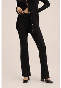 mango - Mango spodnie Slitter damskie kolor czarny szerokie high waist. Stan: podwyższony. Kolor: czarny